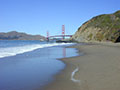 Golden Gate Bridge view from the calm Baker Beach